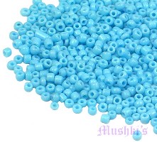 Turquoise opaque plain Indian glass seed bead - click here for large view